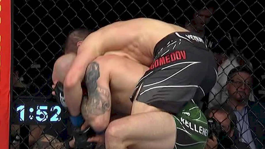 Umar Nurmagomedov Pinning His Opponent Down Wallpaper