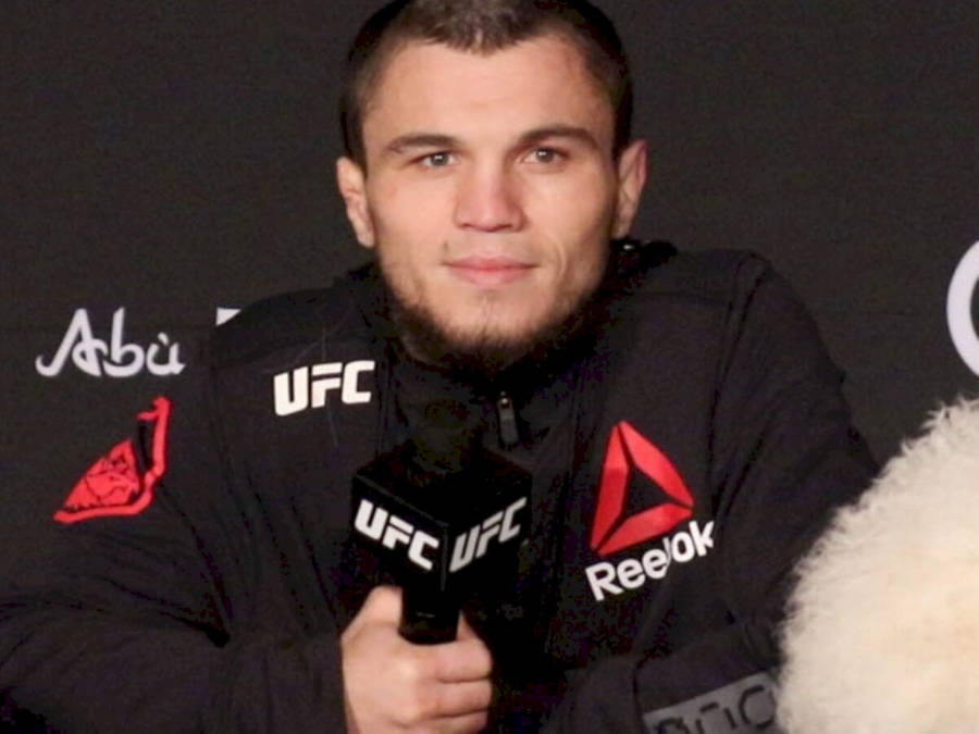 Umar Nurmagomedov Smiling At The Camera Wallpaper