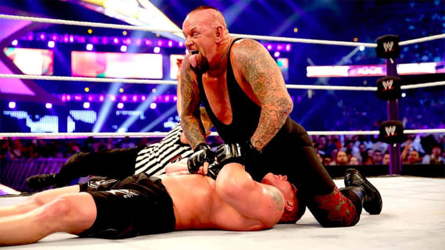 Undertaker Dominating Wrestle Mania Match Wallpaper