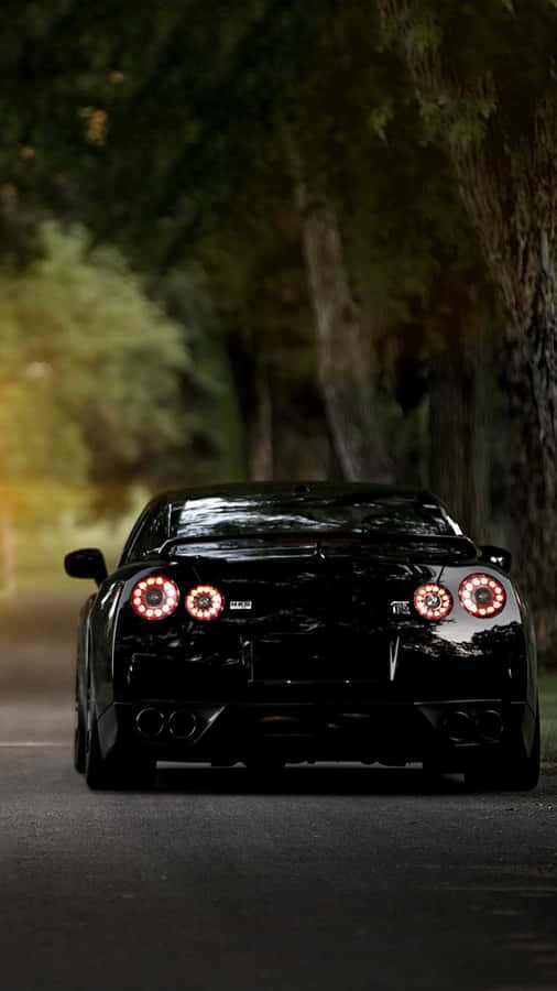Unlock The Cool: Nissan Skyline For Your Iphone Wallpaper