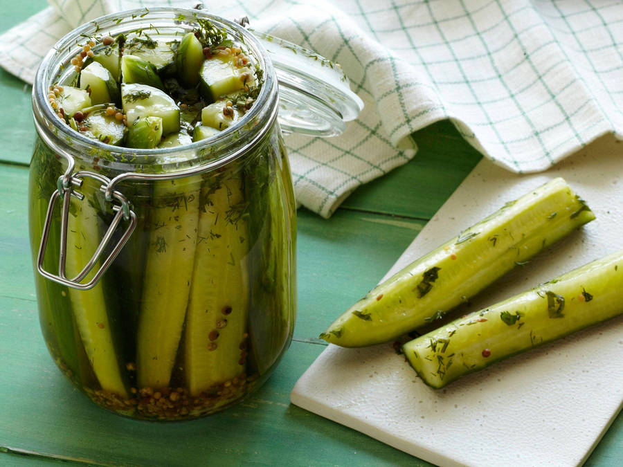 Up-close View Of Sliced Pickles Wallpaper