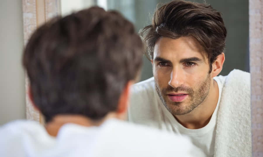 Vain Man Looking Himself In The Mirror Wallpaper