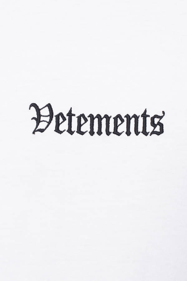 Vetements Embroidered On White Wallpaper