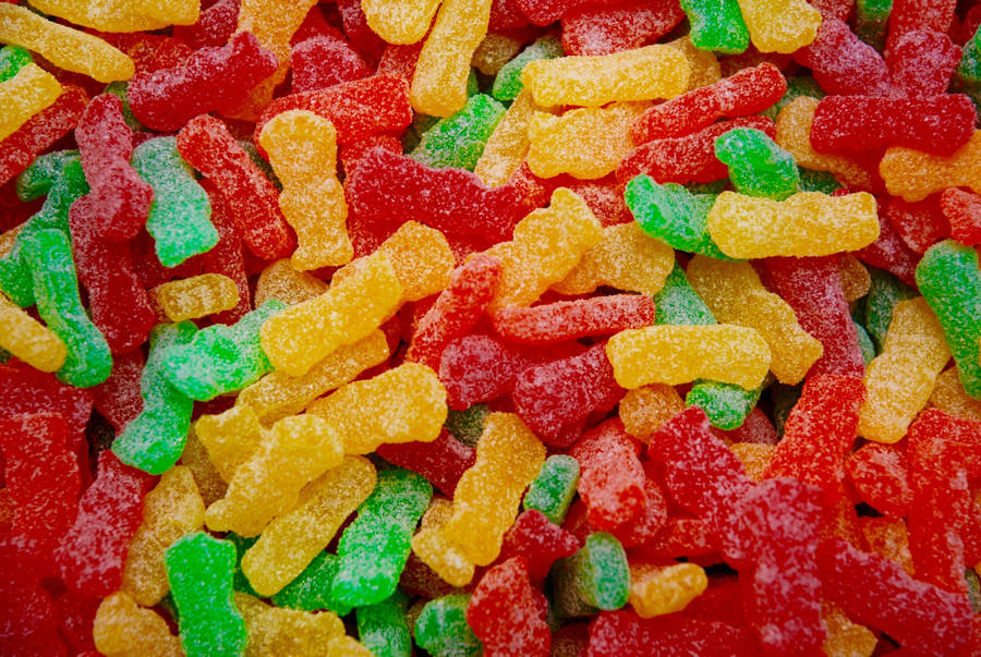 Vibrant Assortment Of Sour Gummy Worms Wallpaper