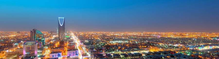 Vibrant Skyline Of Riyadh At Night Wallpaper