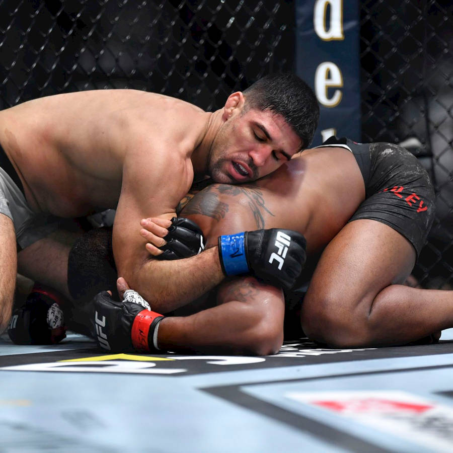 Vicente Luque Pinning His Opponent Down Wallpaper