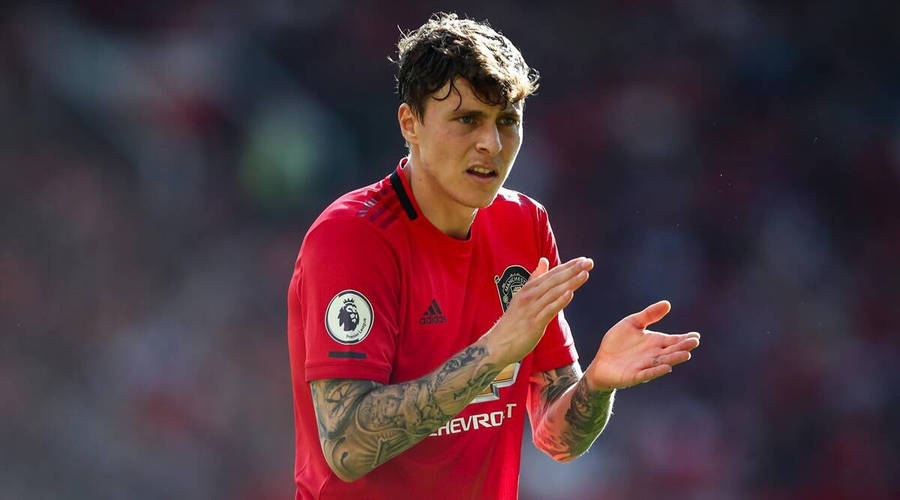 Victor Lindelof In Action On The Football Field Wallpaper