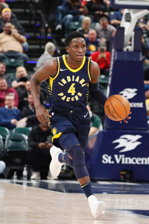 Victor Oladipo Running In The Court Wallpaper