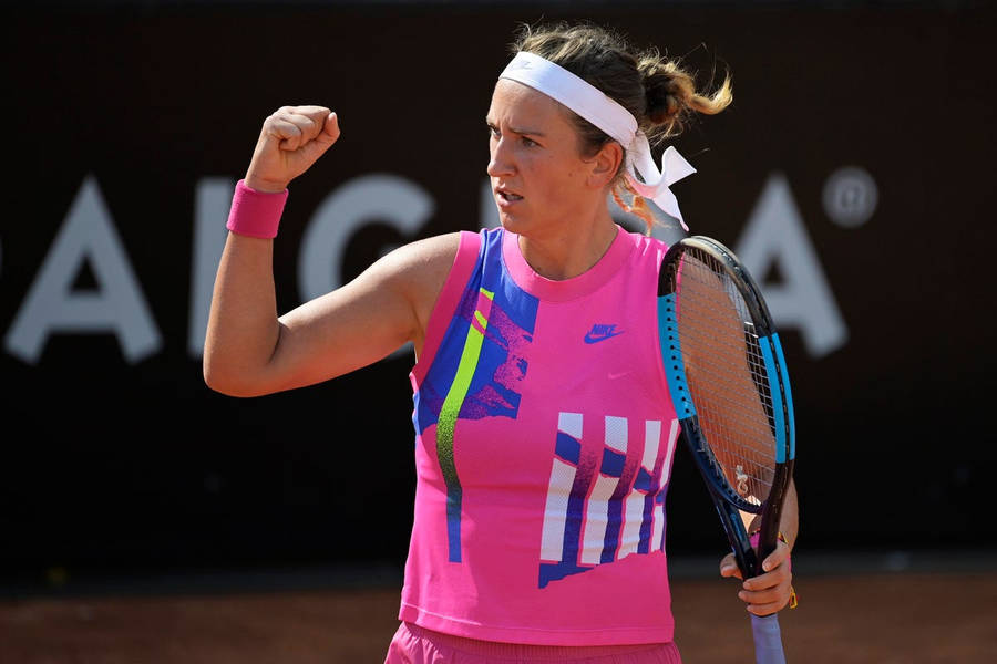 Victoria Azarenka Fist Pumps In Pink Wallpaper