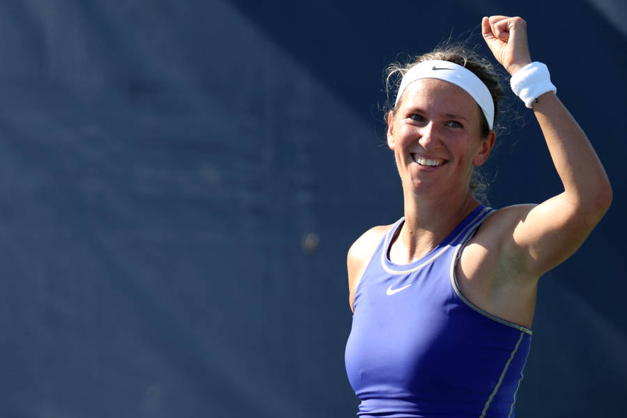 Victoria Azarenka Lifts Arm Victory Cheer Wallpaper