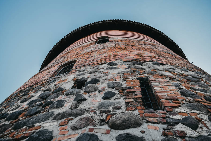 View Of Brick Tower In Lithuania Wallpaper