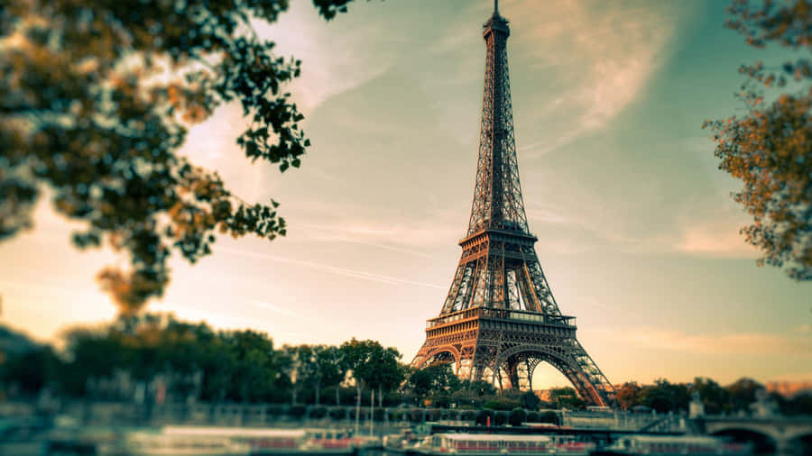 View Of The Beautiful Eiffel Tower In Sunny Paris, France Wallpaper