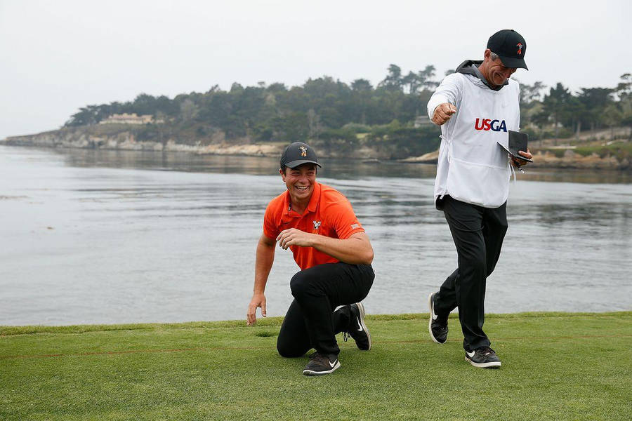 Viktor Hovland Playing Beside A Lake Wallpaper