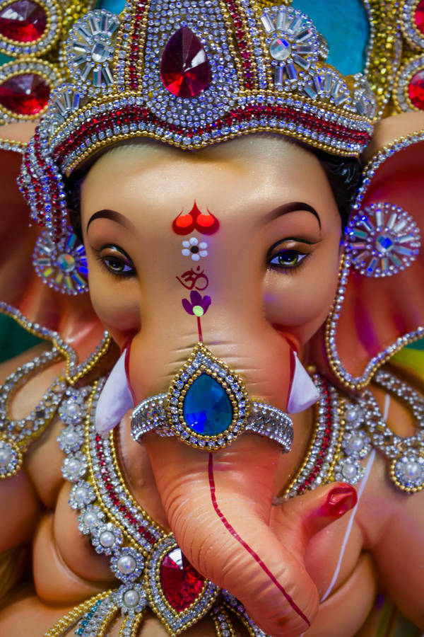 Vinayaka Statue With Gemstone Jewelries Portrait Wallpaper