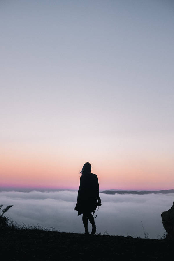 Vintage Aesthetic Clouds Girl With Camera Wallpaper