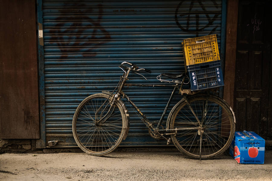 Vintage Bike At Storefront Wallpaper