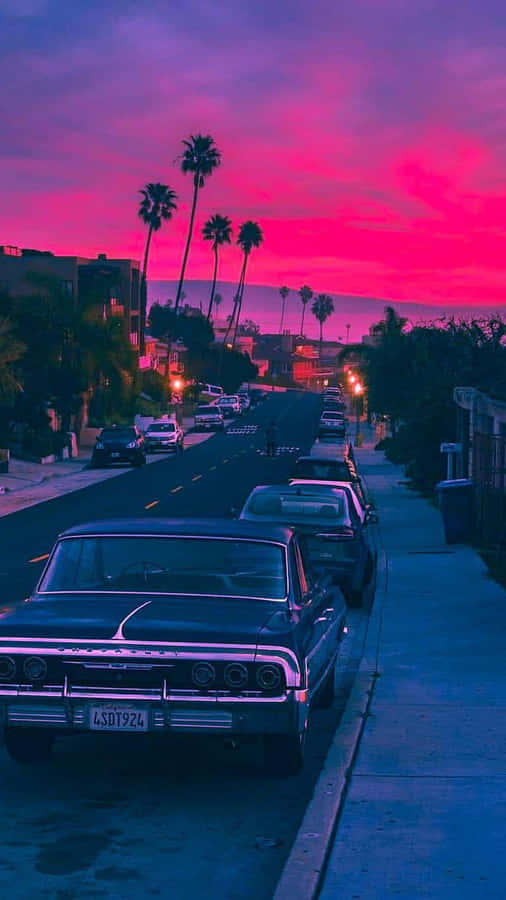 Vintage Car Under Pink Sky Wallpaper