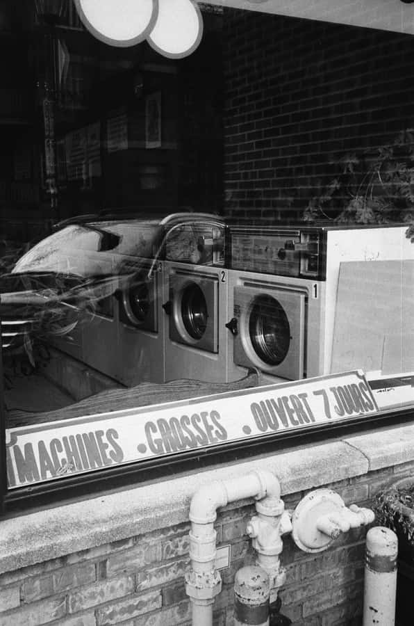 Vintage Laundromat Window Display Wallpaper