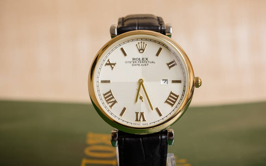 Vintage Rolex Wristwatch With Earth’s Globe: Timeless Luxury Wallpaper