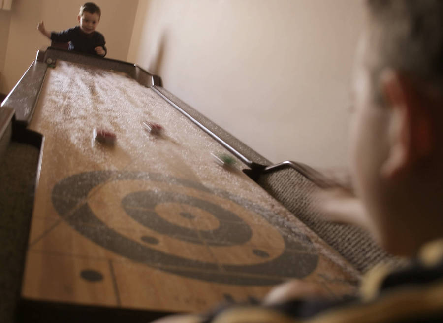 Vintage Shuffleboard Brown Wood Table Wallpaper