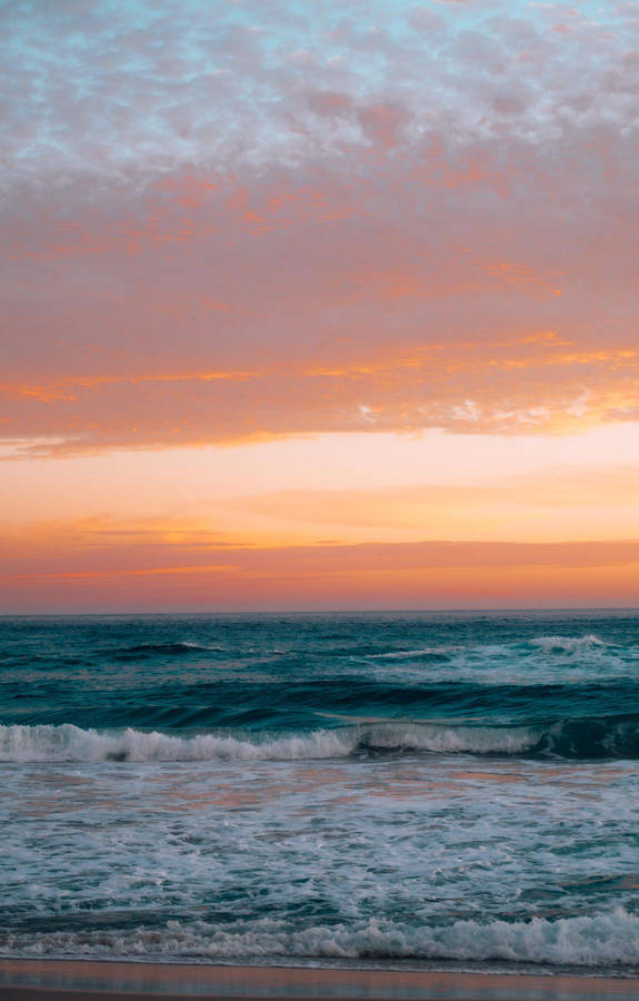 Vivid Blue And Orange Beach Sunrise Wallpaper