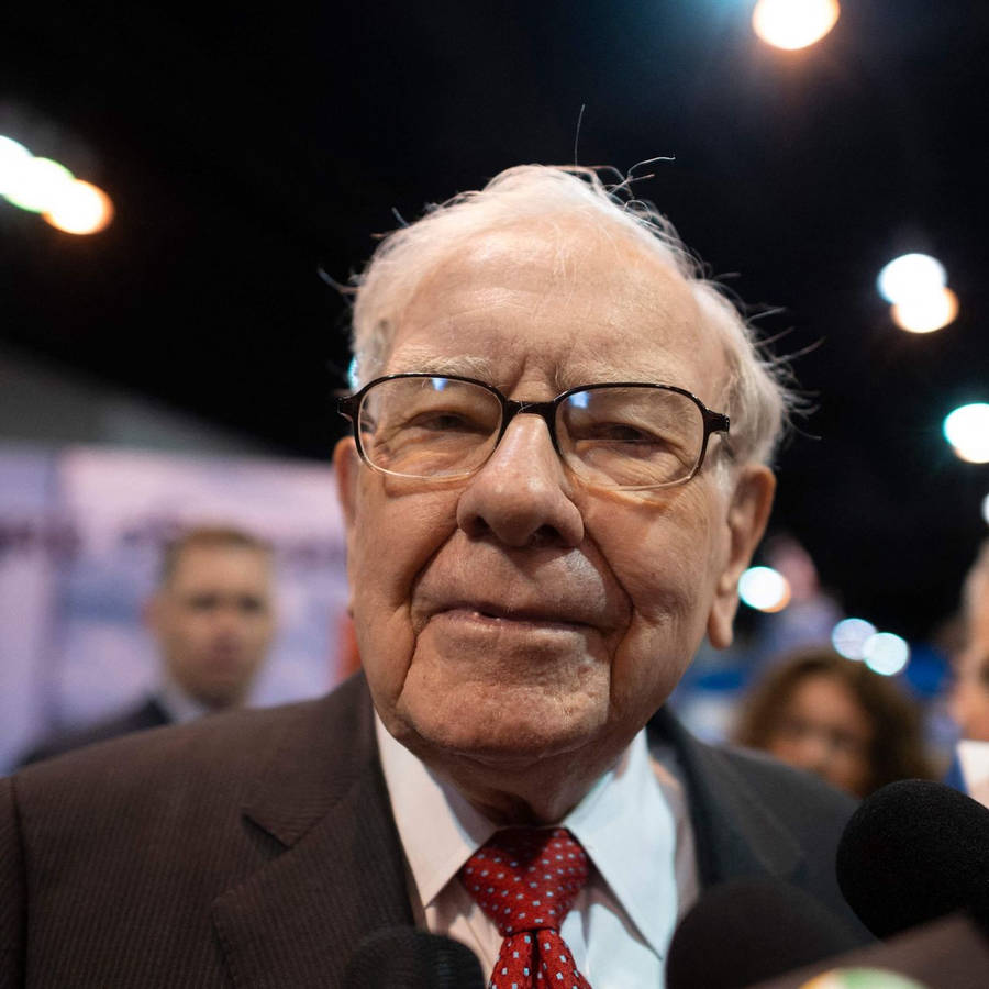 Warren Buffett, The Oracle Of Omaha, In A Candid Capture Wallpaper