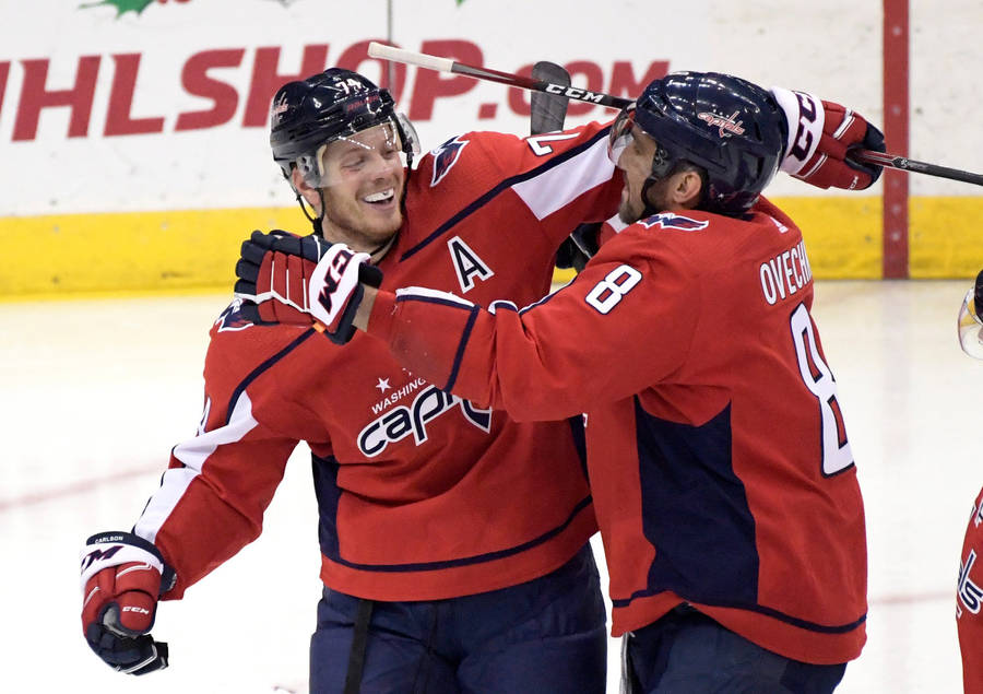 Washington Capitals Alexander Ovechkin Hugging John Carlson Wallpaper