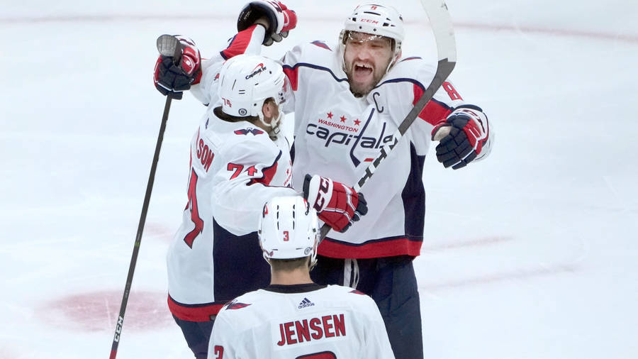 Washington Capitals Celebrating John Carlson And Alexander Ovechkin Wallpaper