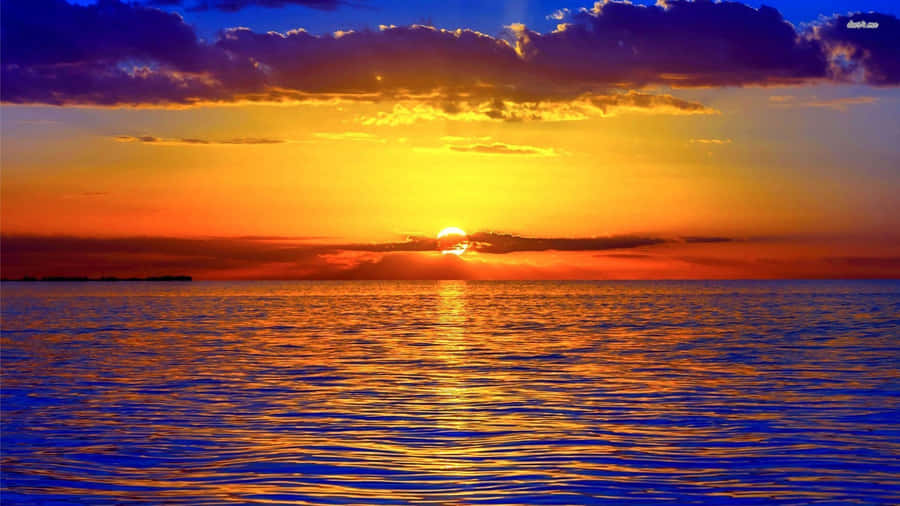 Watch The Colors Of A Beautiful Sunrise From Your Desktop Wallpaper