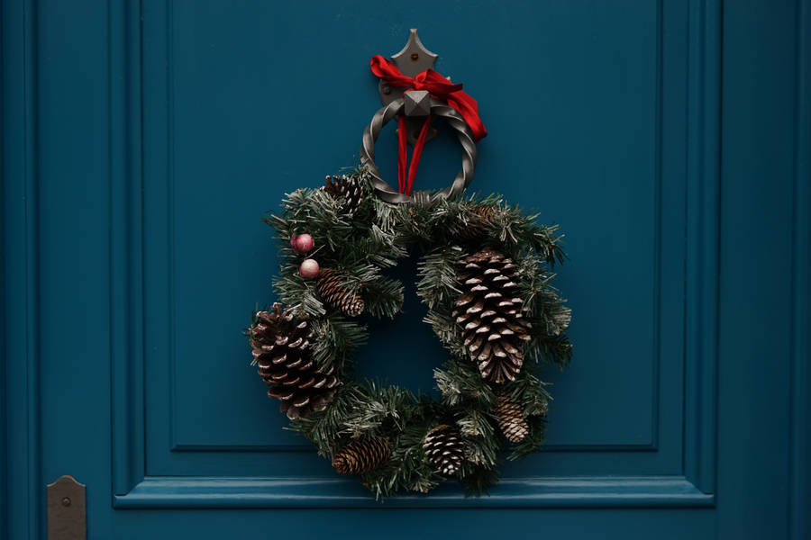 Welcome Guests To Your Winter Wonderland With This Festive Christmas Wreath. Wallpaper