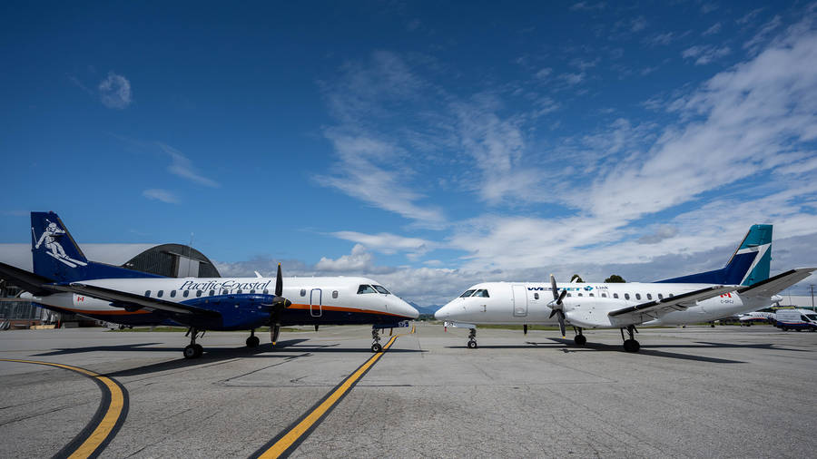 Westjet Airplane Facing Each Other Wallpaper