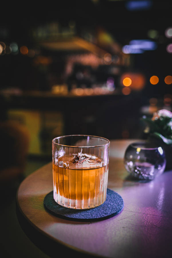 Whiskey Glass On Coaster Wallpaper