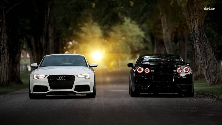 White Audi Rs Beside Black Nissan Wallpaper