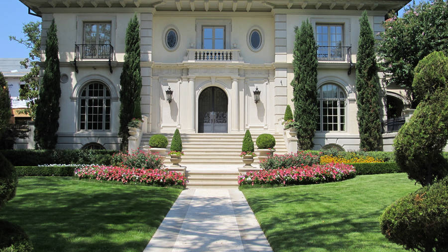 White Beautiful House With Green Grass Wallpaper