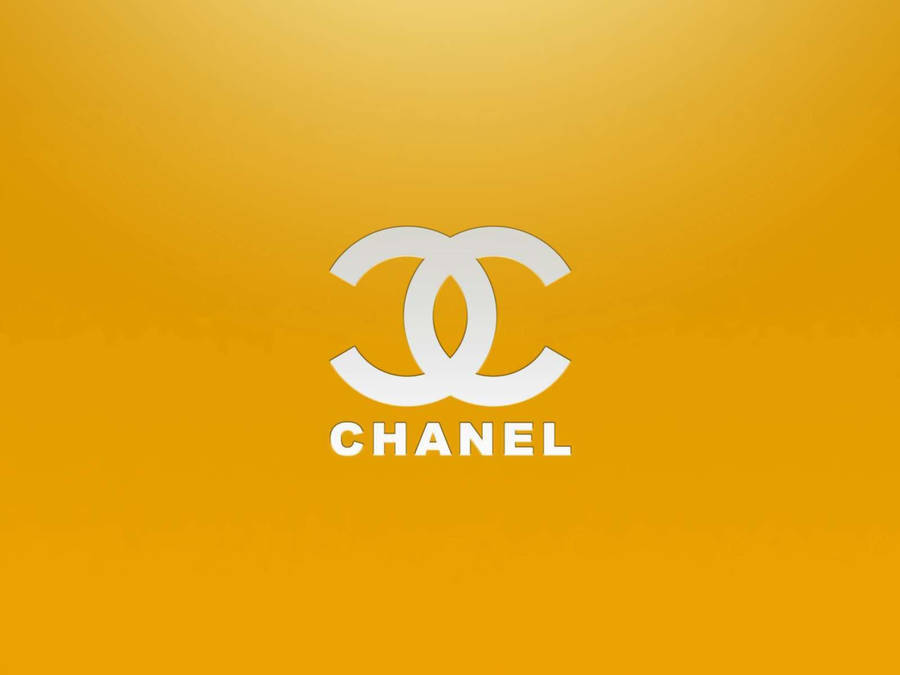 White Chanel Logo On Golden Yellow Wallpaper