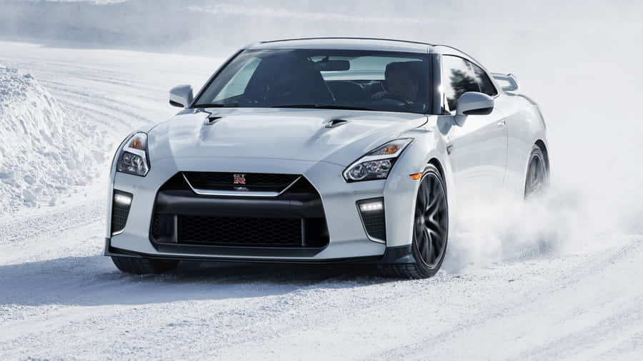 White Nissan R35 Gtr Car Snowy Road Wallpaper