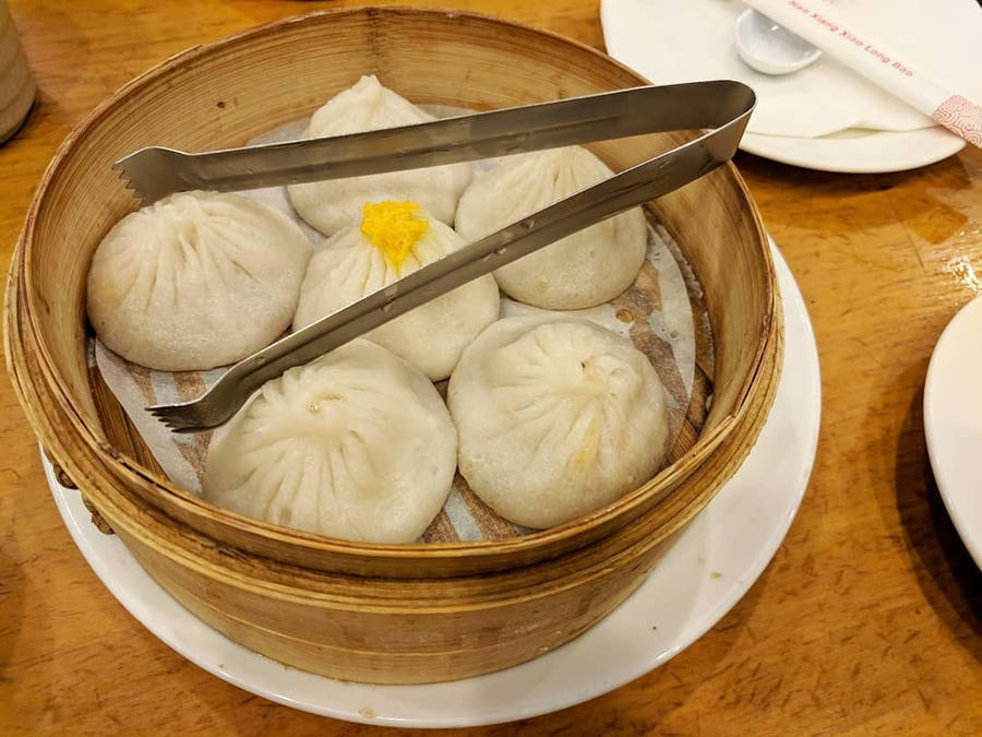 White Xiaolongbao With Metal Tongs Wallpaper