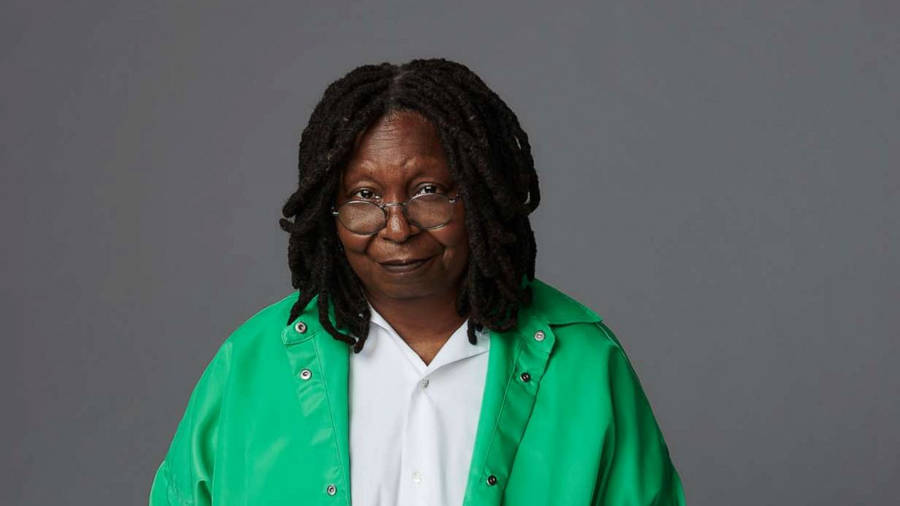 Whoopi Goldberg Engages In Style With A Vibrant Neon Green Jacket. Wallpaper