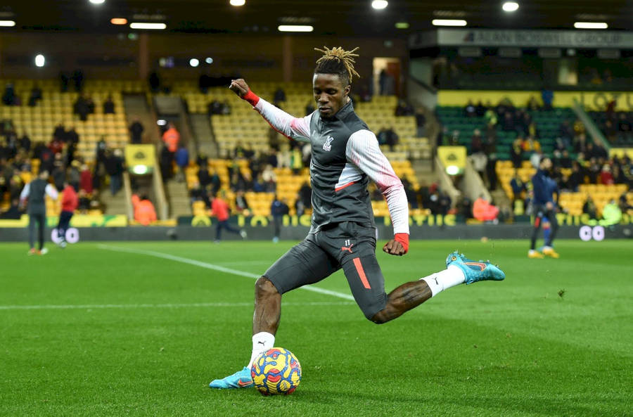 Wilfried Zaha In Indoor Football Field Wallpaper