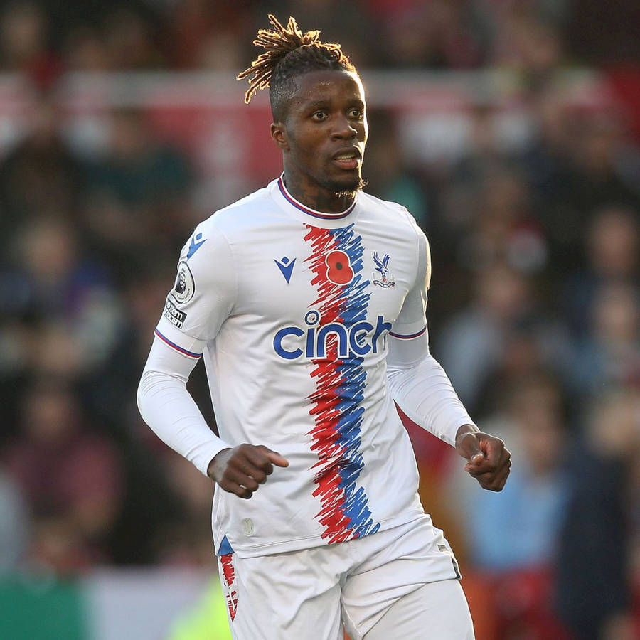 Wilfried Zaha Wearing White Football Uniform Wallpaper