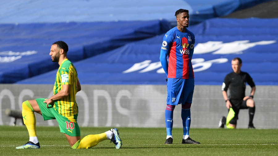 Wilfried Zaha With Other Football Players Wallpaper