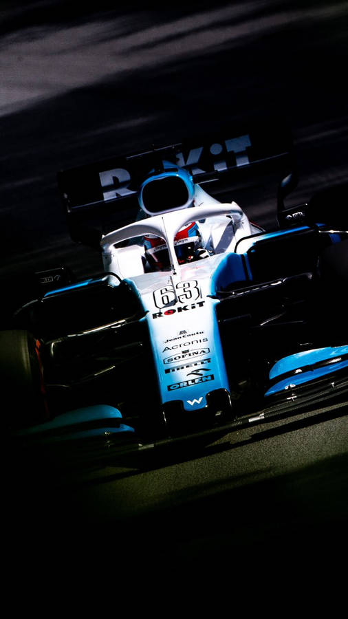 Williams Car 63 Under Spotlight Wallpaper