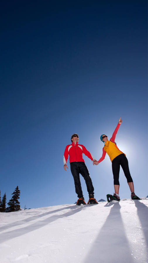 Winter Pose During Snowshoeing. Wallpaper