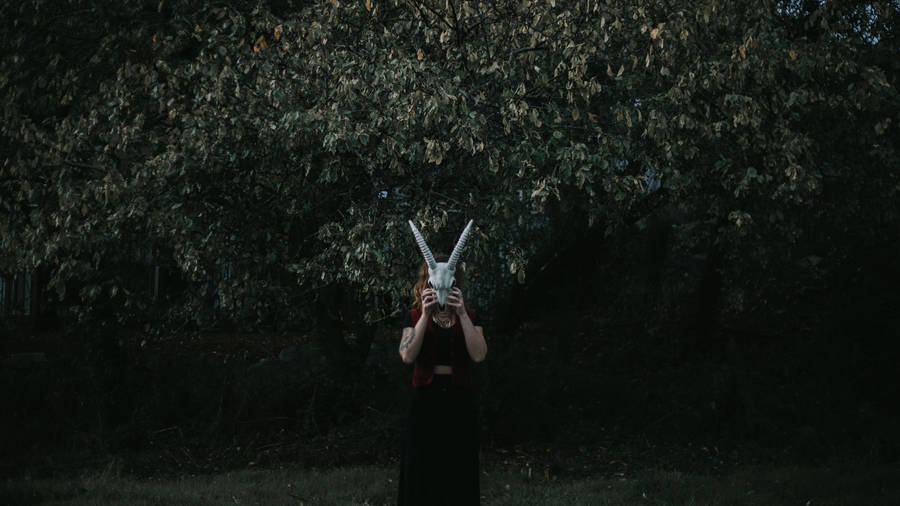 Witch With Horned Mask Wallpaper