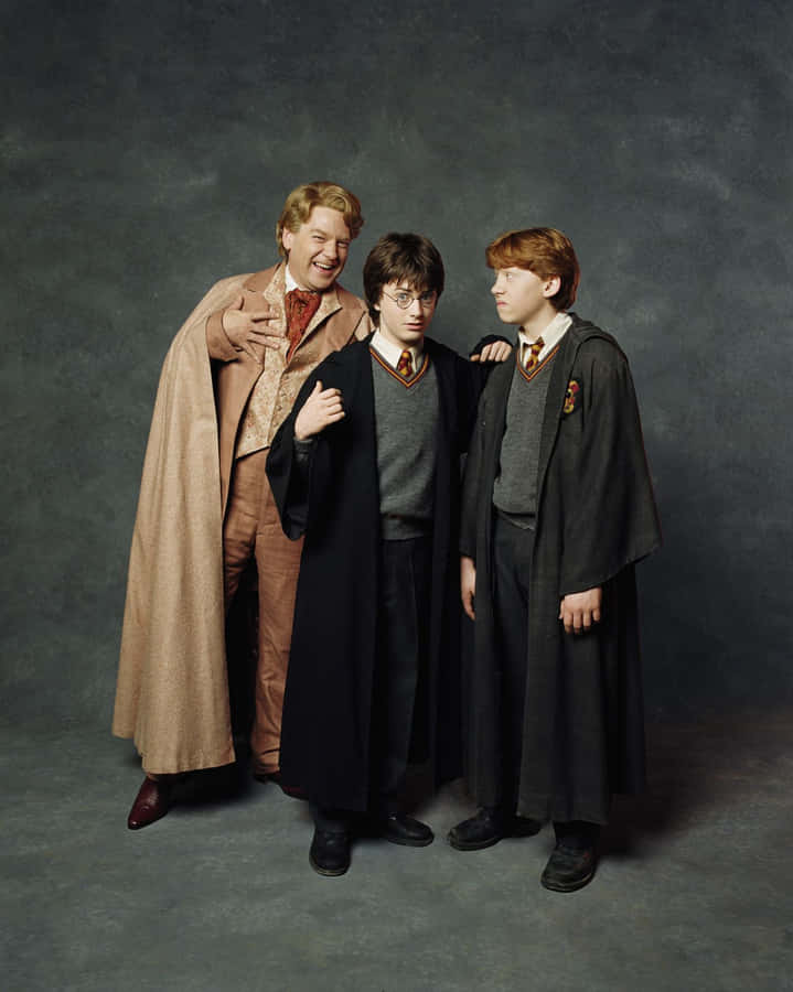 Wizarding Trio With Professor.jpg Wallpaper