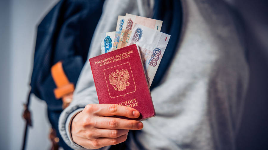 Woman Holding Russian Passport And Banknote Wallpaper