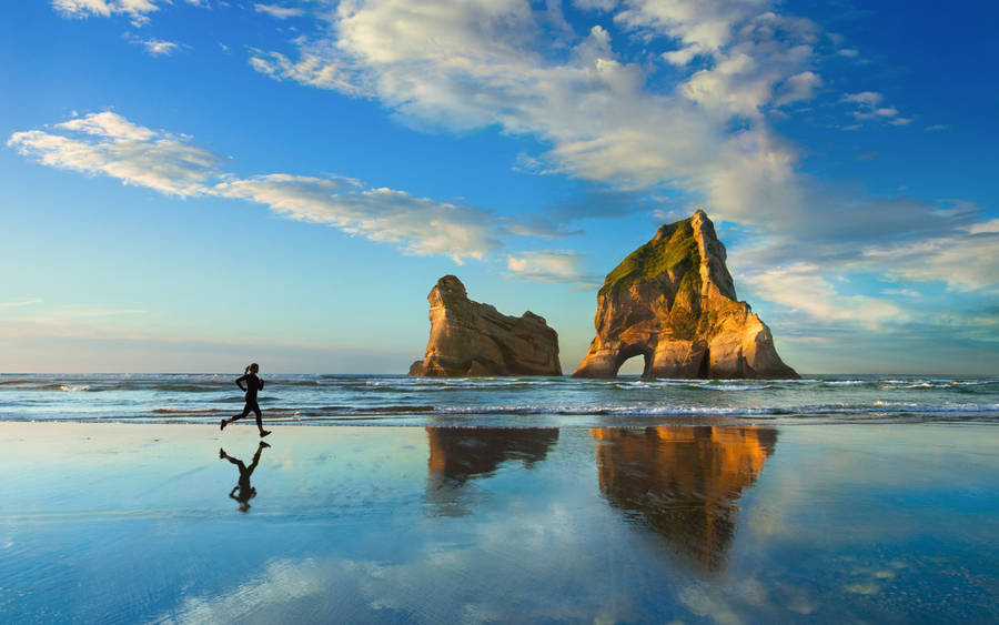 Woman Running In Beach Shore Wallpaper