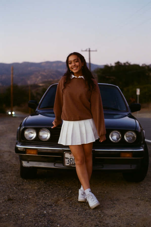 Woman Wearing White Pleated Miniskirt Wallpaper