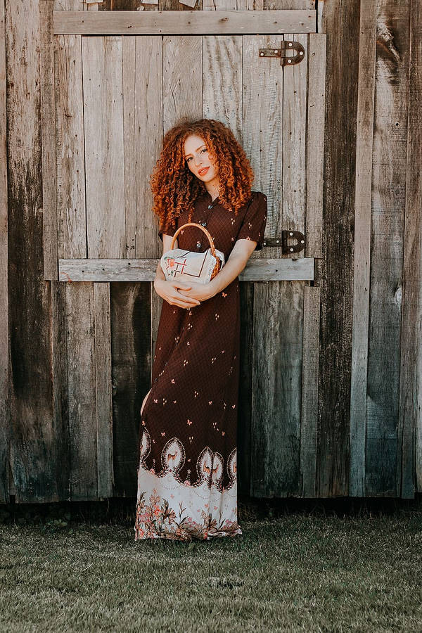 Woman With Curly Hair On Barn Wallpaper