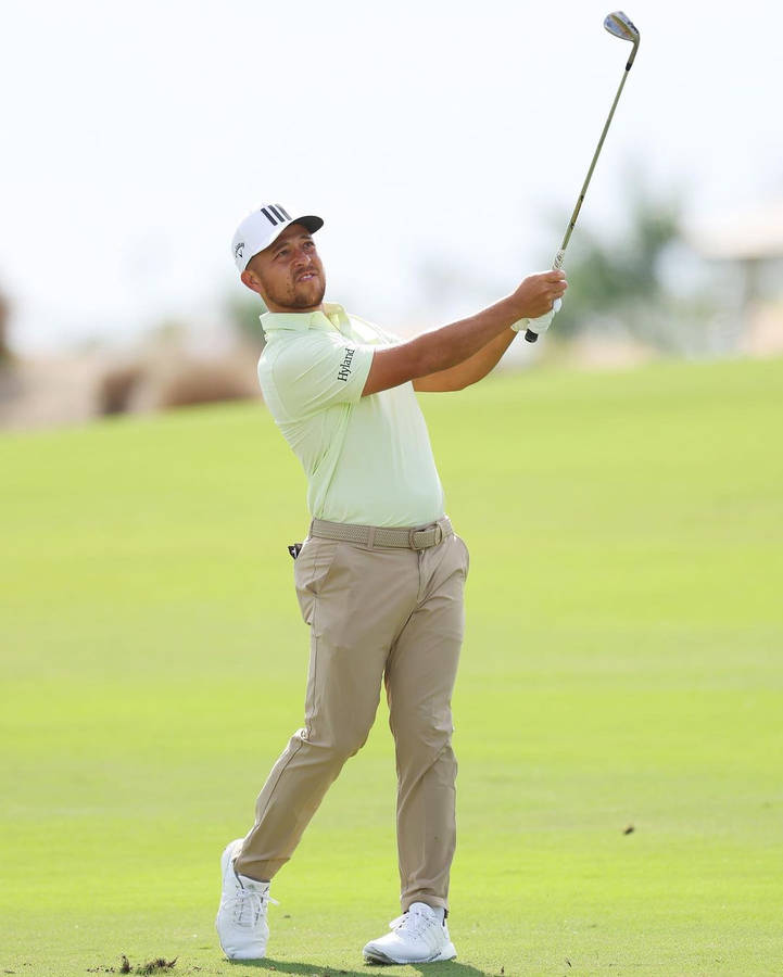 Xander Schauffele Full Body Golf Swing Wallpaper